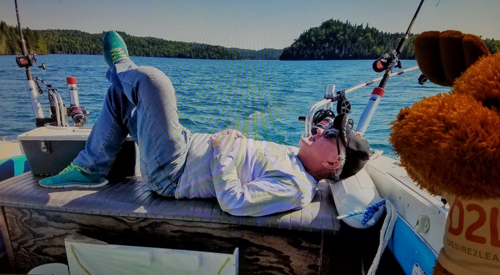 Barry napping on the back of the fishing boat at Isle Royale National Park