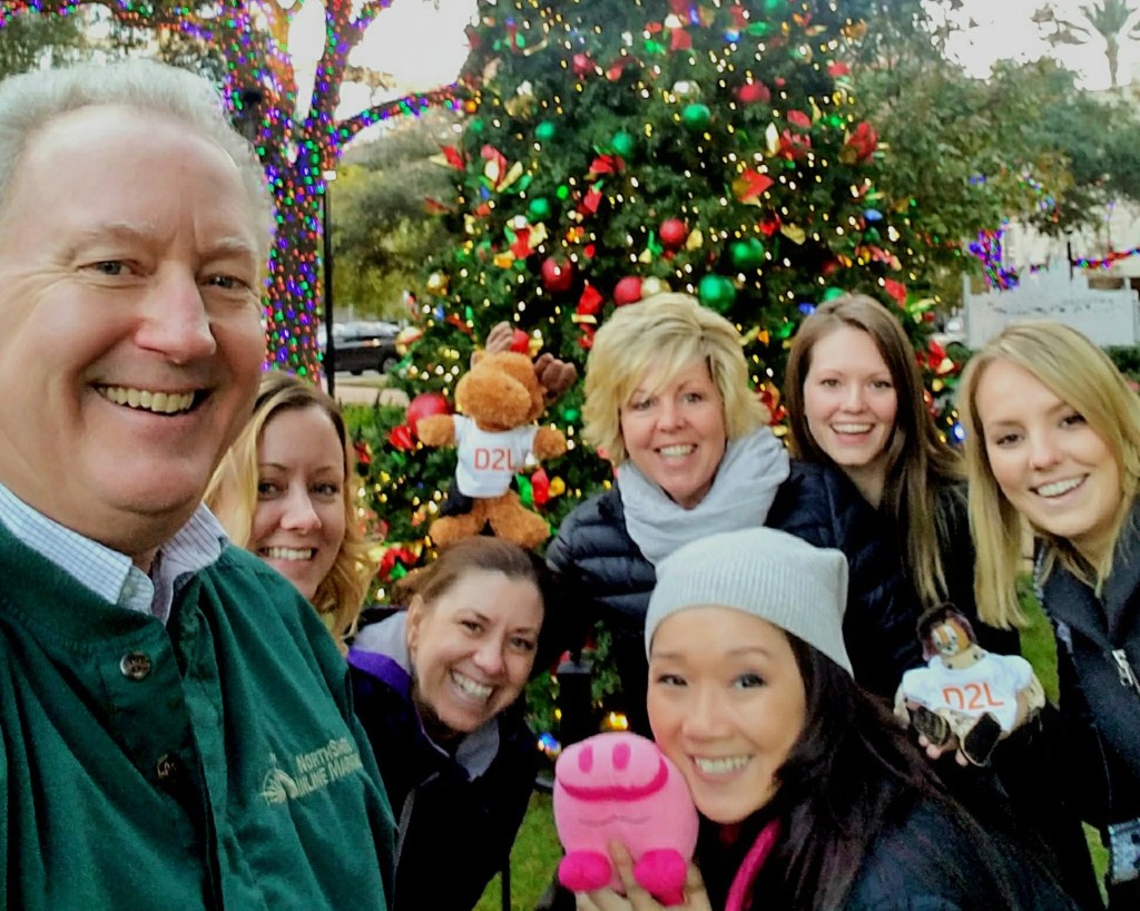 Two of my bosses, Bre and Ivy, the two heads in the lower middle