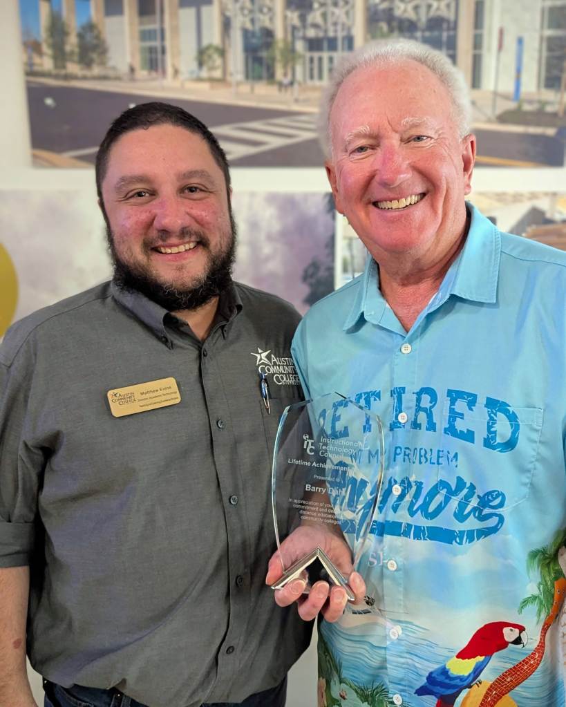 Matt Evins and Barry with the award